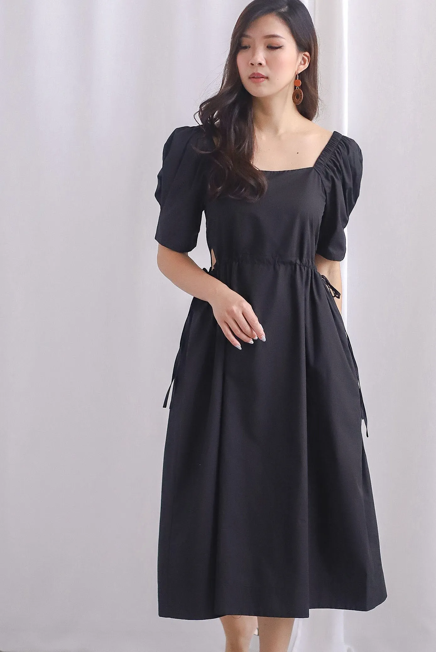 Brindle Cut Out Drawstring Dress In Black