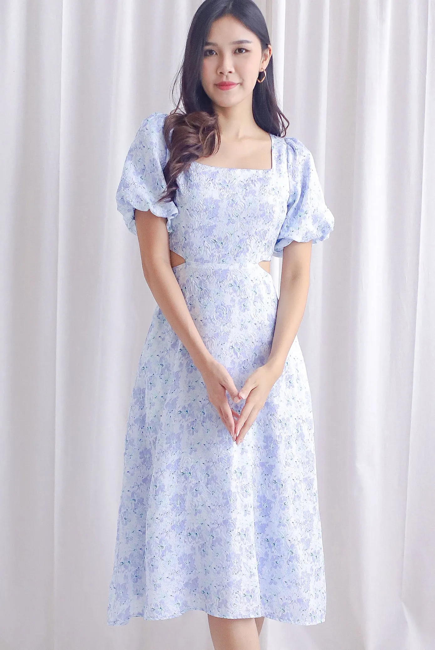 Chantel Sleeved Cut Out Waist Midi Dress In Emboss Floral