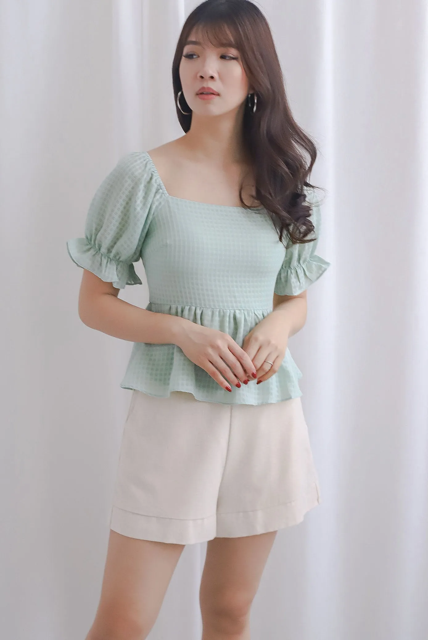 Enysa Gingham Sleeve Peplum Top In Pistachio