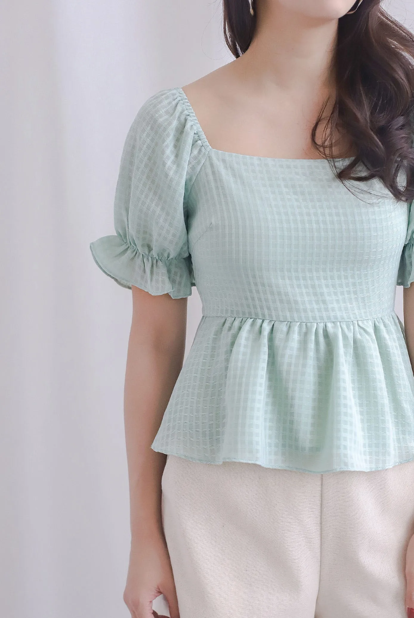 Enysa Gingham Sleeve Peplum Top In Pistachio