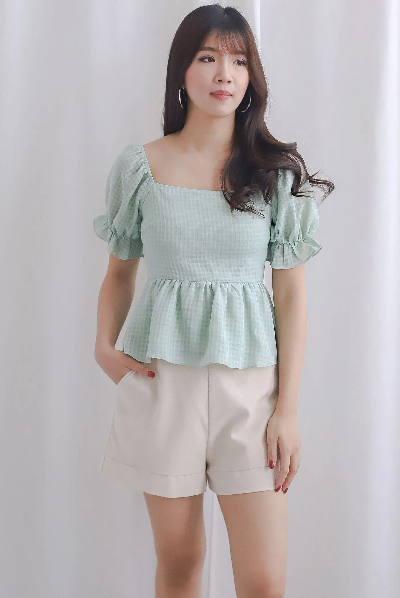 Enysa Gingham Sleeve Peplum Top In Pistachio