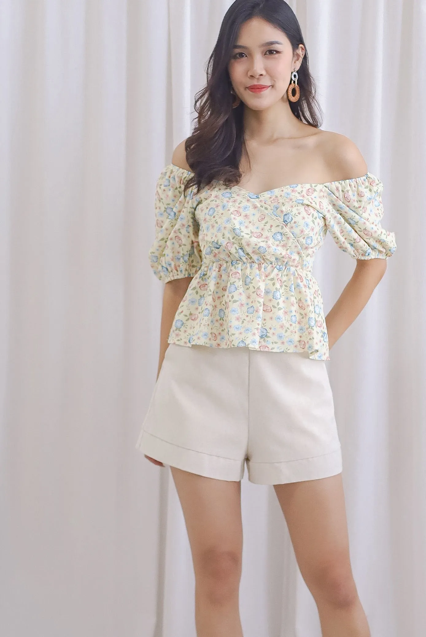 Isabel Floral Puffy Sleeves Peplum Top In Yellow