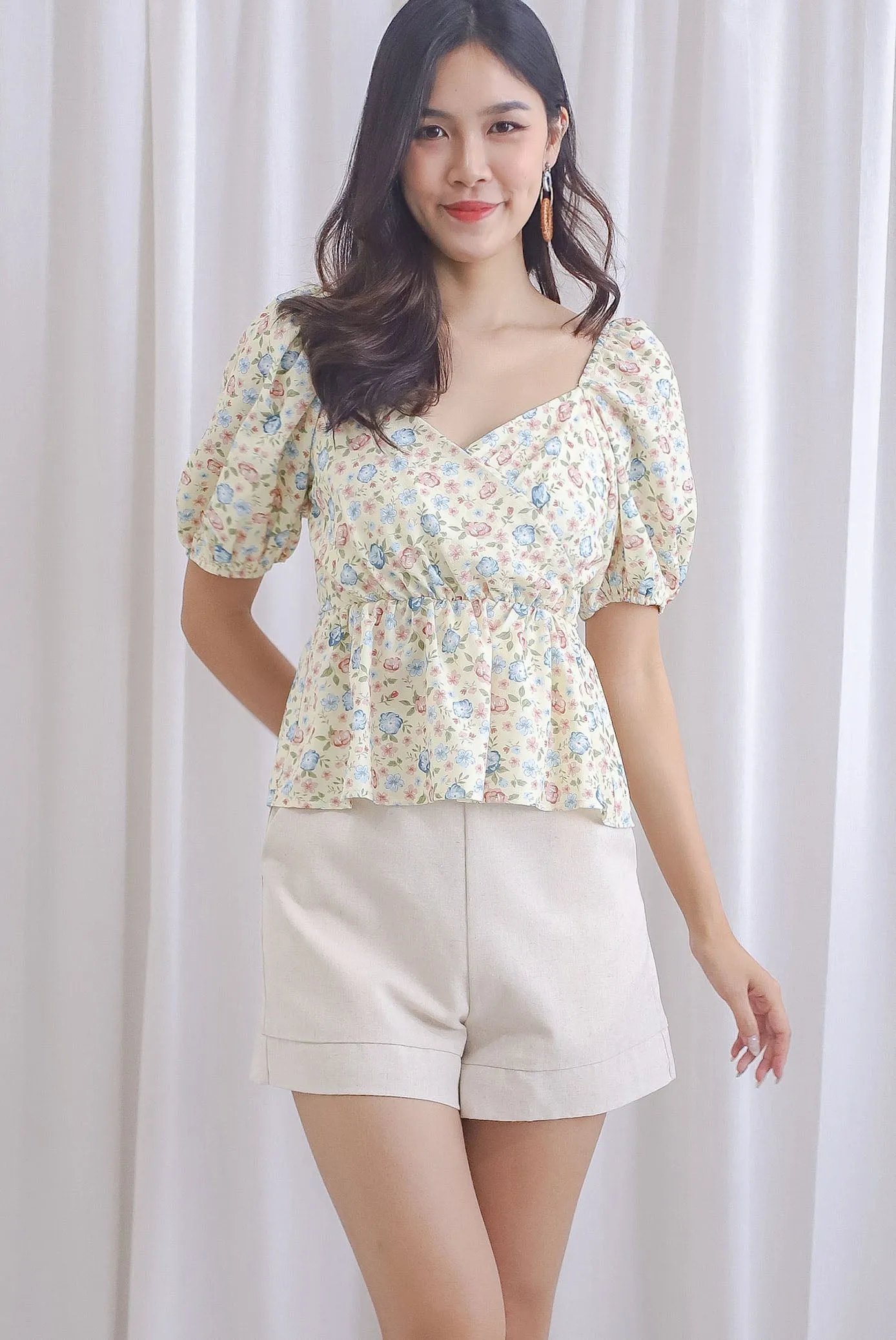 Isabel Floral Puffy Sleeves Peplum Top In Yellow