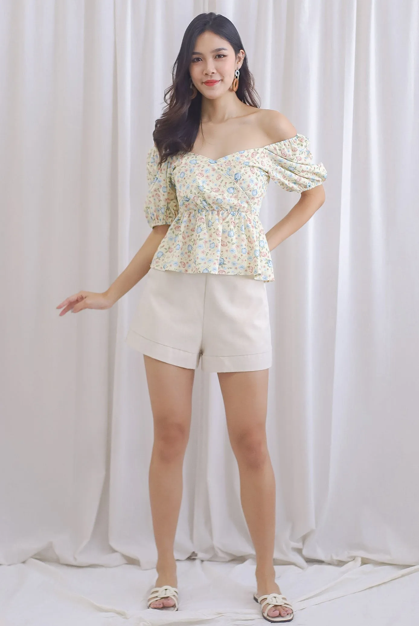 Isabel Floral Puffy Sleeves Peplum Top In Yellow
