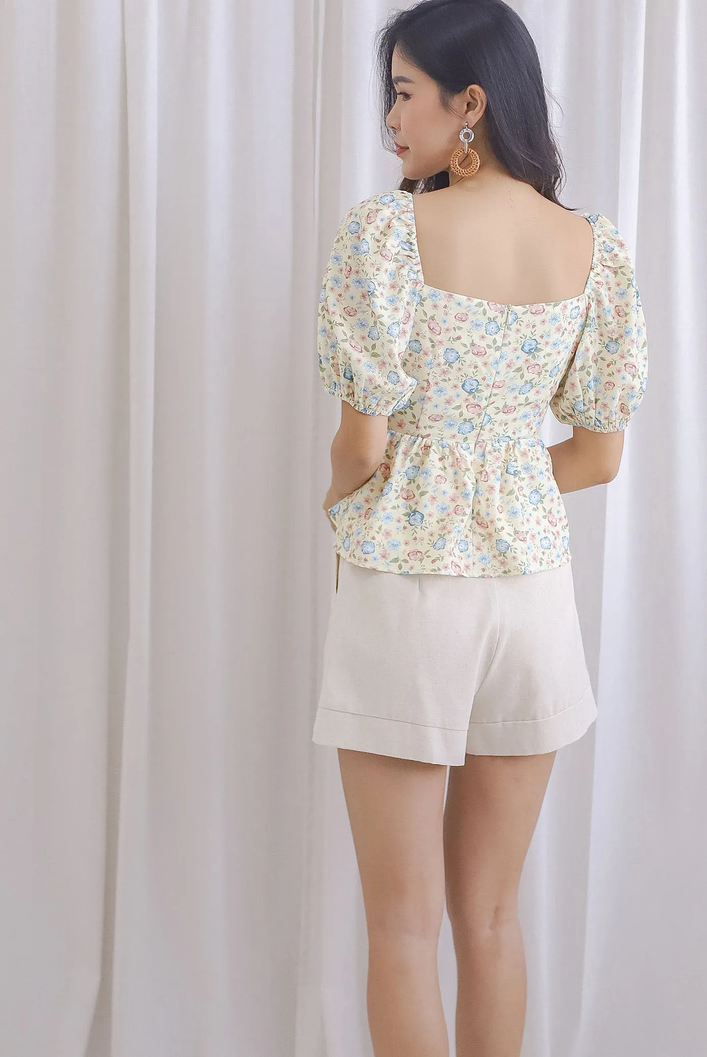 Isabel Floral Puffy Sleeves Peplum Top In Yellow