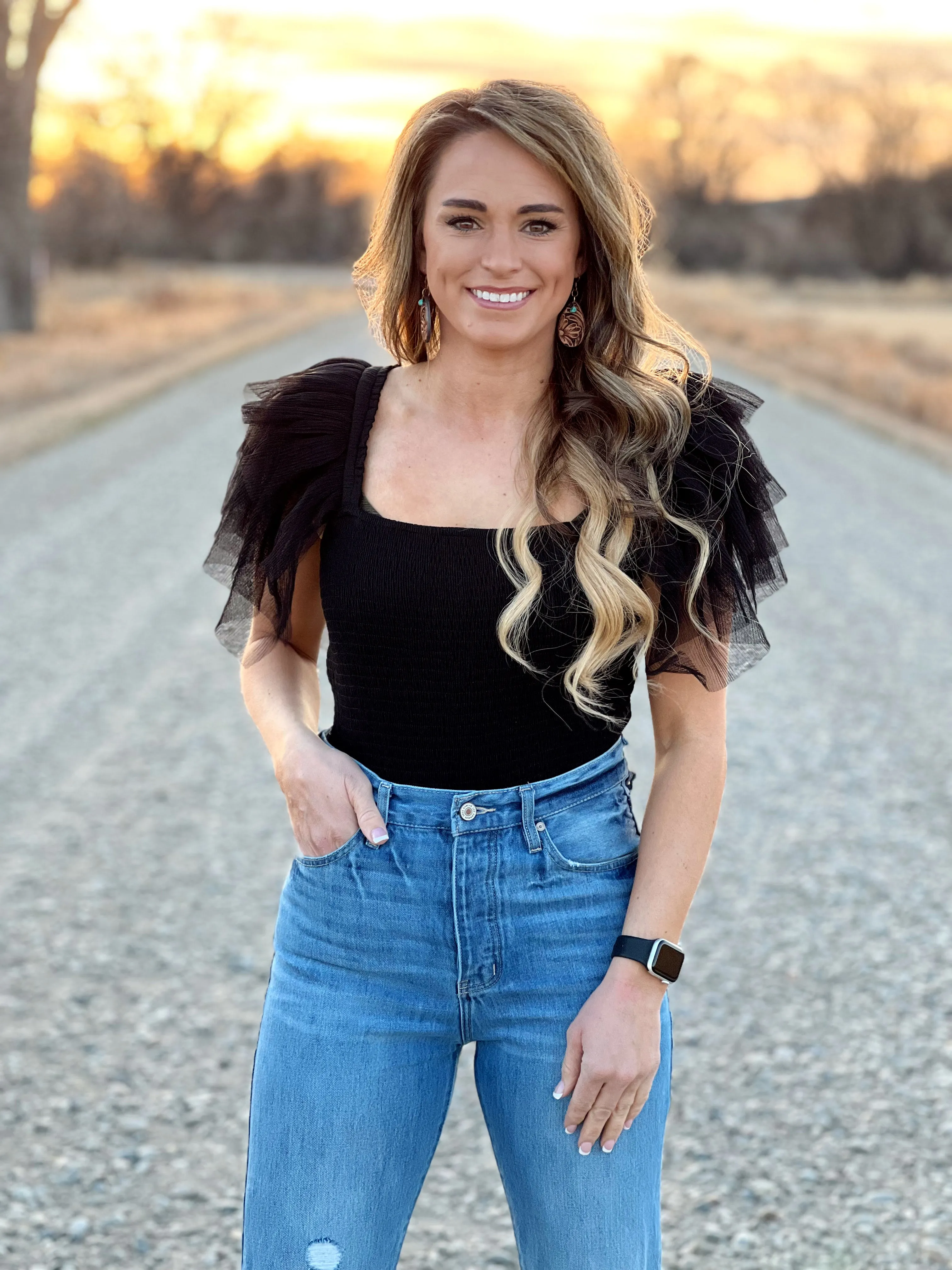 The Ruffle Sleeve Bodysuit in Black