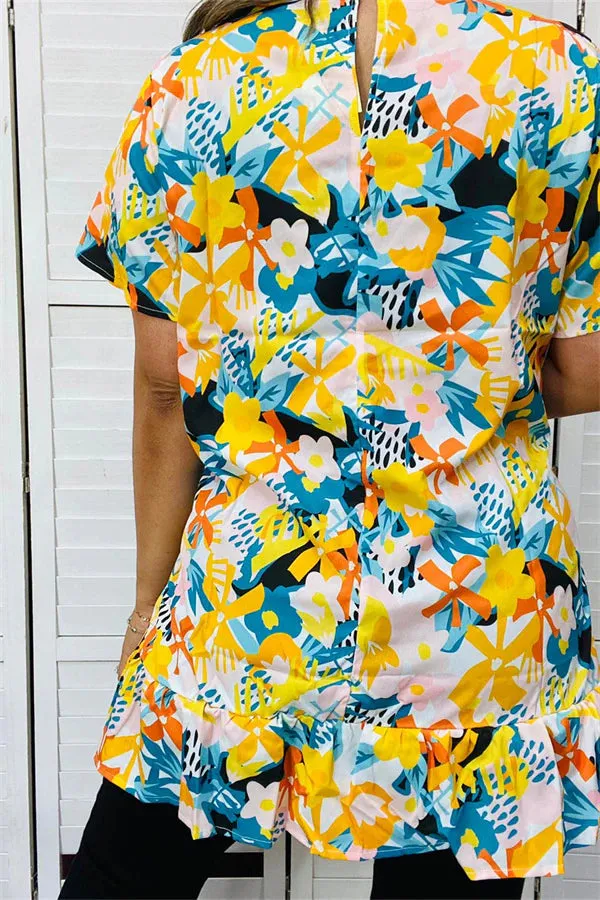 Yellow floral top with ruffle hem
